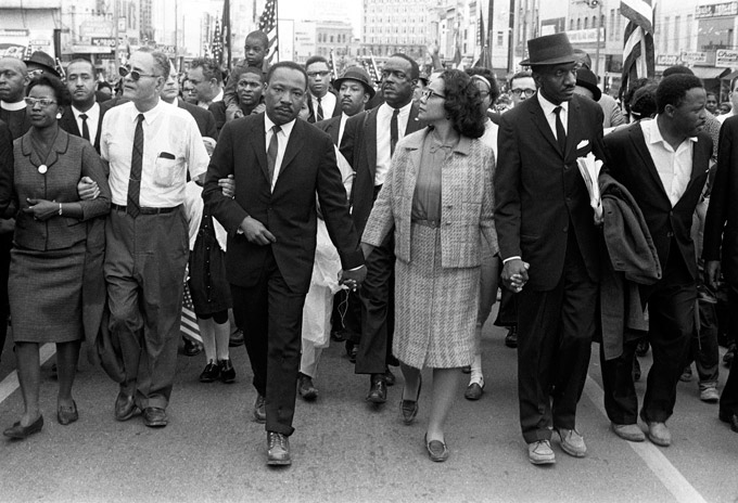 Dr. Martin Luther King, Jr. arrives in Montgomery, Alabama on March 25 1965 at the culmination of the Selma to Montgomery March. Pictured from left, Ralph Bunche, Dr. Martin Luther King, Jr., Coretta Scott King, Rev. Fred Shuttlesworth, Hosea Williams. (Photo by Morton Broffman/Getty Images)